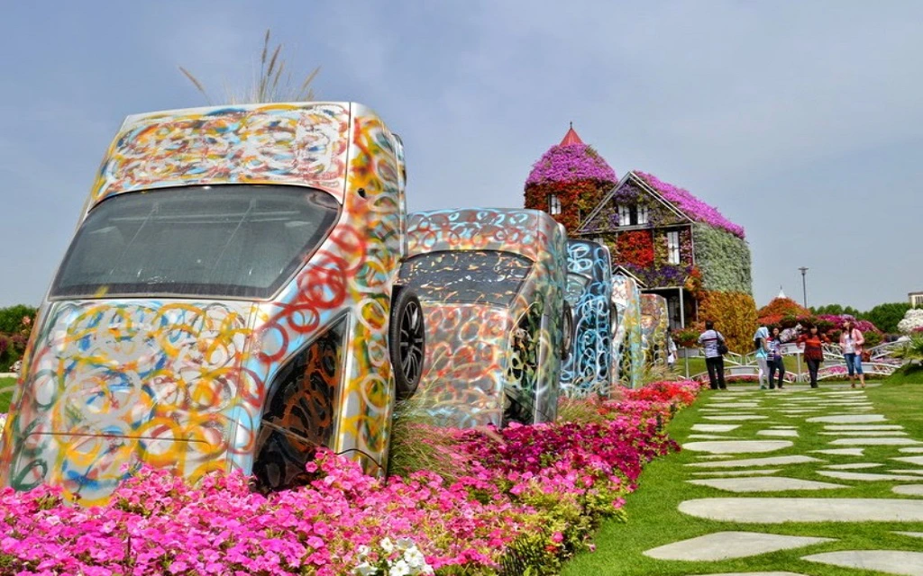 Dubai Miracle Garden - Half buried cars